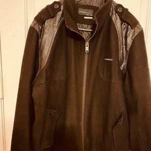 Rocawear wool with leather like accents. Size cl mens Streetwear.